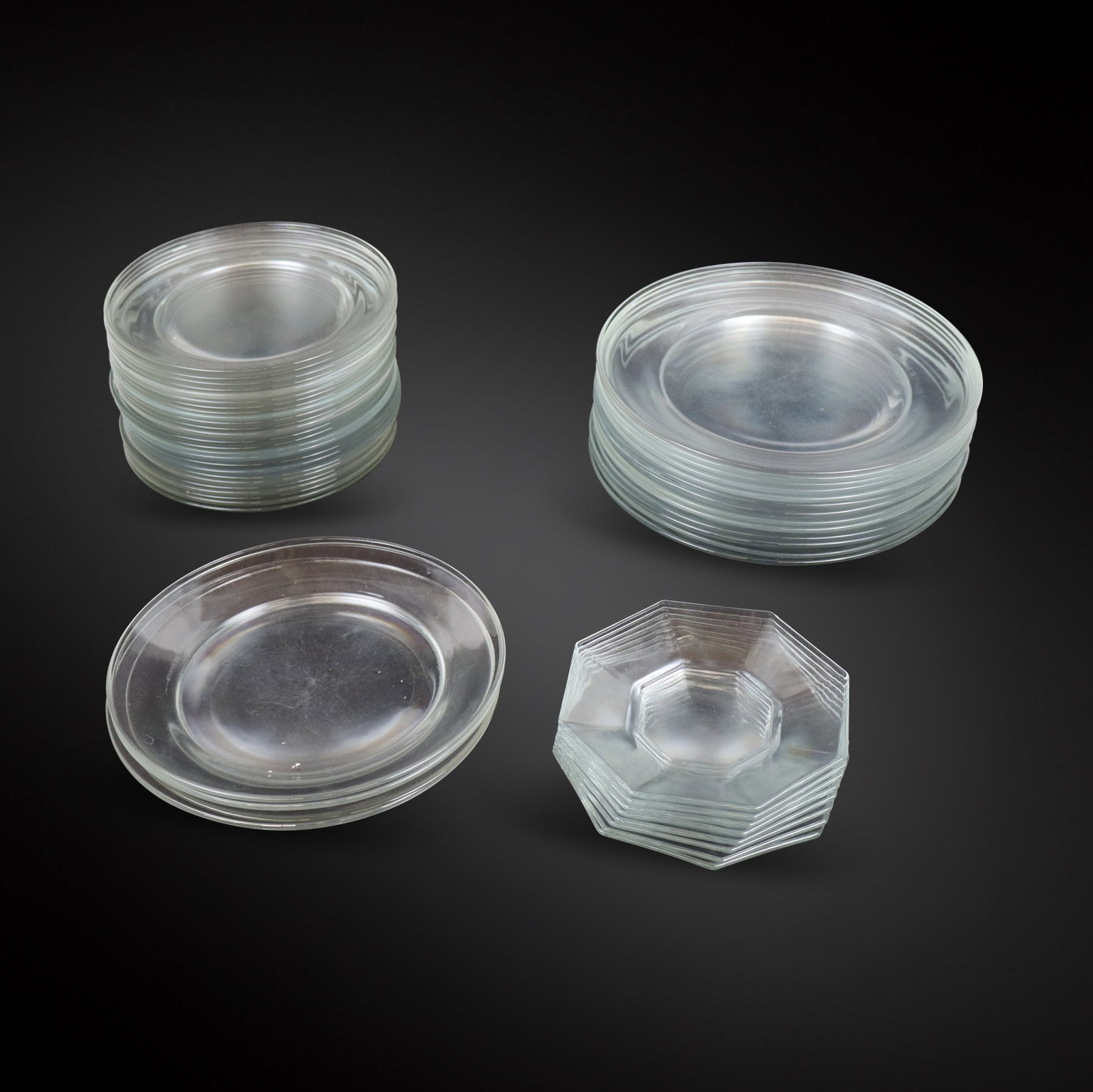 Arcoroc & Other Glass Plates, 50: Group of assorted colorless plates, comprising thirteen Arcoroc luncheon plates [9" Diameter], four Arcoroc salad plates [8" Diameter], twenty-five Arcoroc hor d'oeuvre plates [6.75" Diameter], and ei