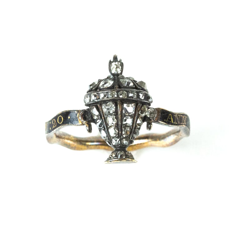 George III Diamond & Enamel Memorial Ring: George III old mine diamond, enamel, gold, silver, and hair memorial ring, probably English, 1763, centered as a silver topped gold old diamond set urn, joined by black enamel band inscribed " Ann Ste
