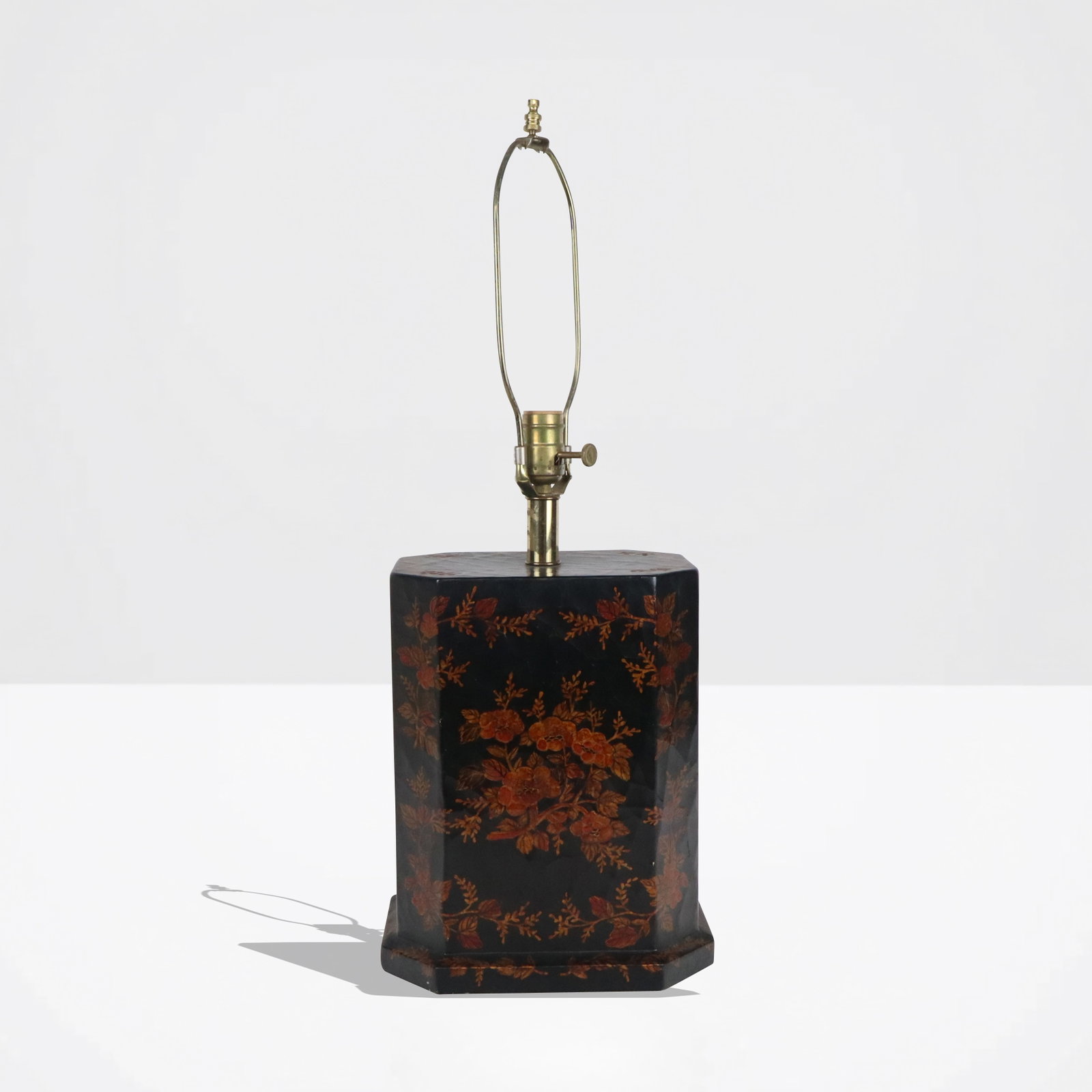 Chinoiserie Decorated Single Lamp: Chinoiserie decorated single lamp, having floral and leaf lacquer decoration. [17" H to socket x 10" W x 7" D]. In good condition.