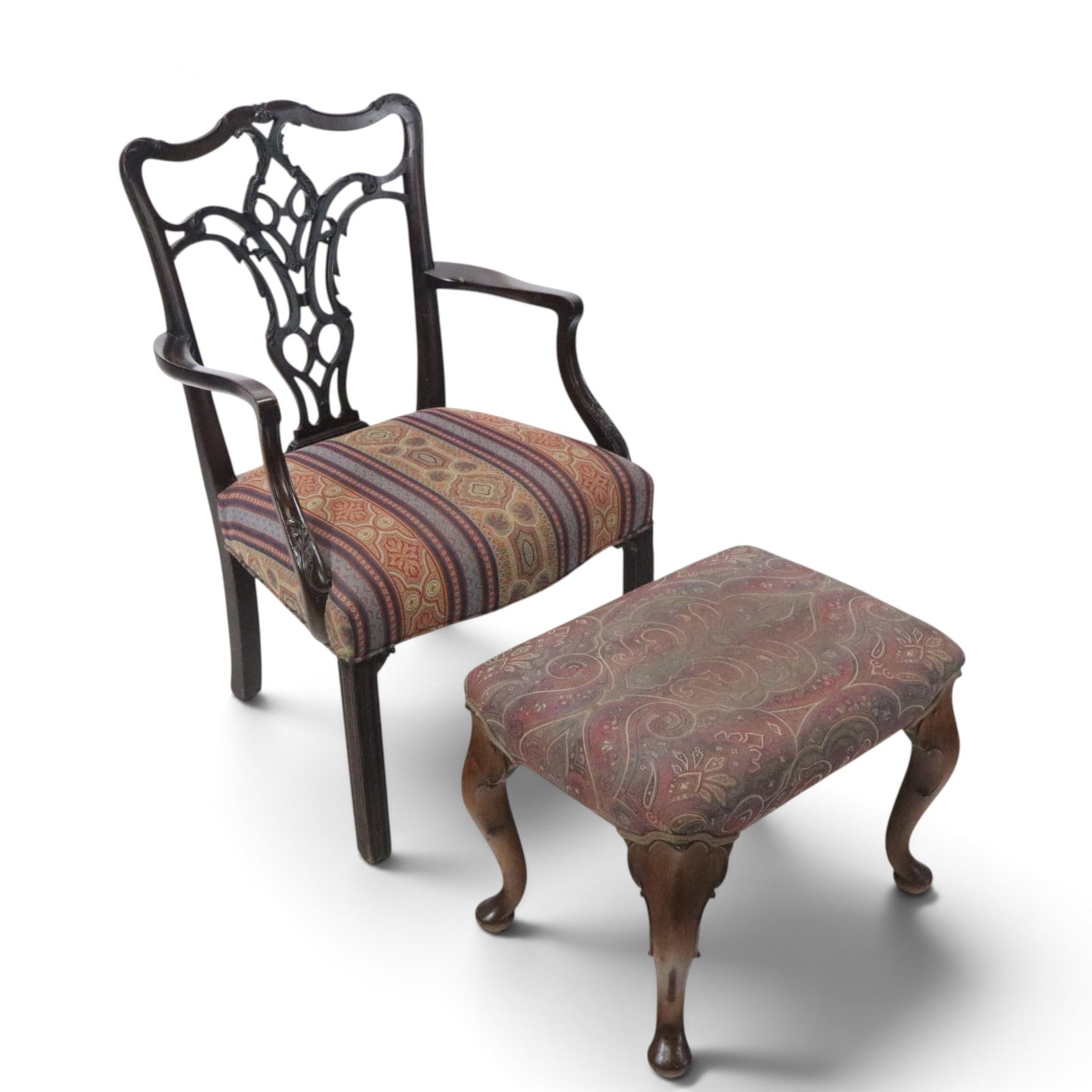 Georgian Armchair & Ottoman: Georgian style armchair and ottoman, English, late 19th-20th century, the openwork armchair accompanied by a Queen Anne style upholstered ottoman. [Armchair: 38" H -17.5" H to seat x 23.5" W x 19" D; 