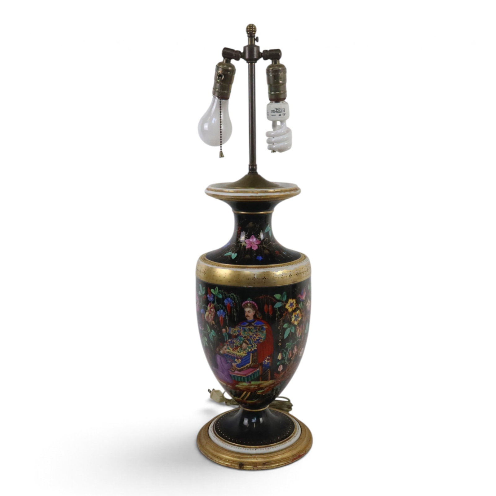 Paris Porcelain Asian Decorated Lamp: Paris porcelain single table lamp, French, early 20th century, with allover floral, bird and fruit design, including a seated Asian nobleman. [29" H x 9" Diameter (base)]. In overall good condition.