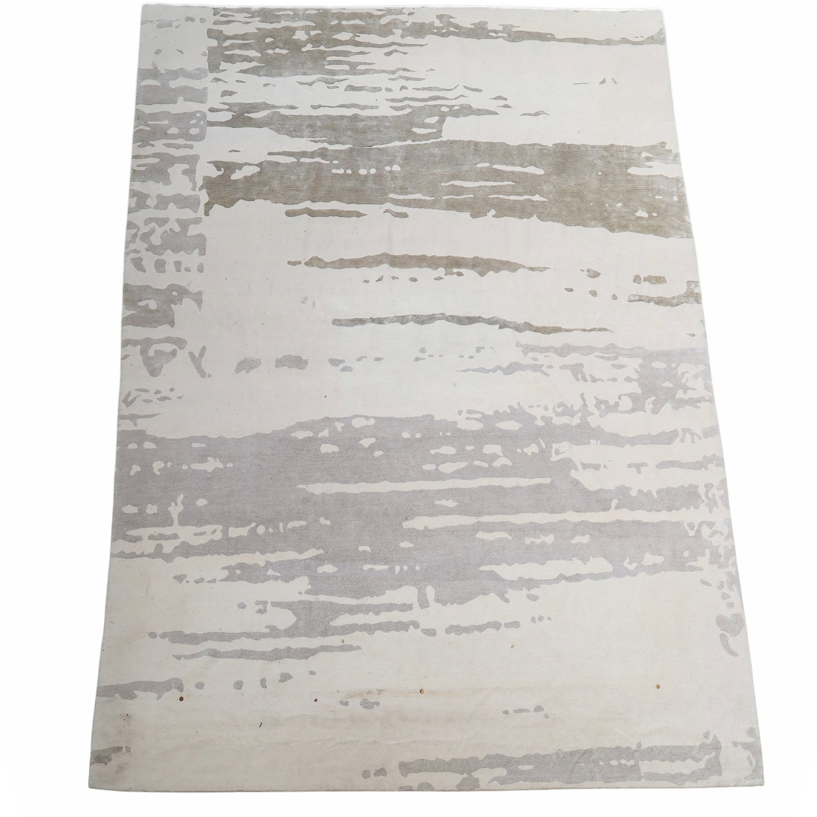 Warp & Weft Contemporary Area Rug: Warp & Weft contemporary area rug, retailed by Goodweave, with various labels to underside, having a beige ground with grey designs. [165" L x 119" W]. Overall condition is fine, some wear and stainin