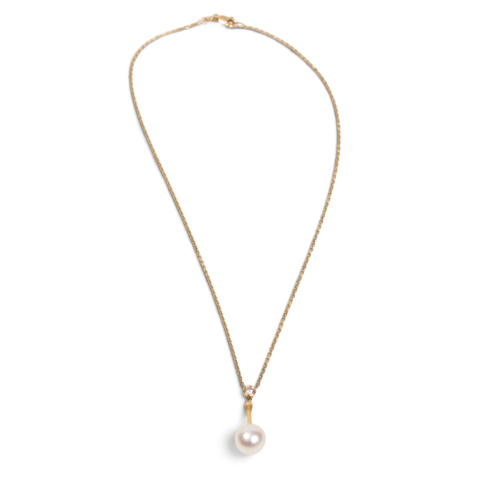Cultured Pearl & Diamond Pendant With Chain: Cultured Pearl, diamond & 14K yellow gold pendant with chain having a collet-set diamond suspending a white gold organic-shaped link with white cultured pearl terminal, one round brilliant-cut diamond