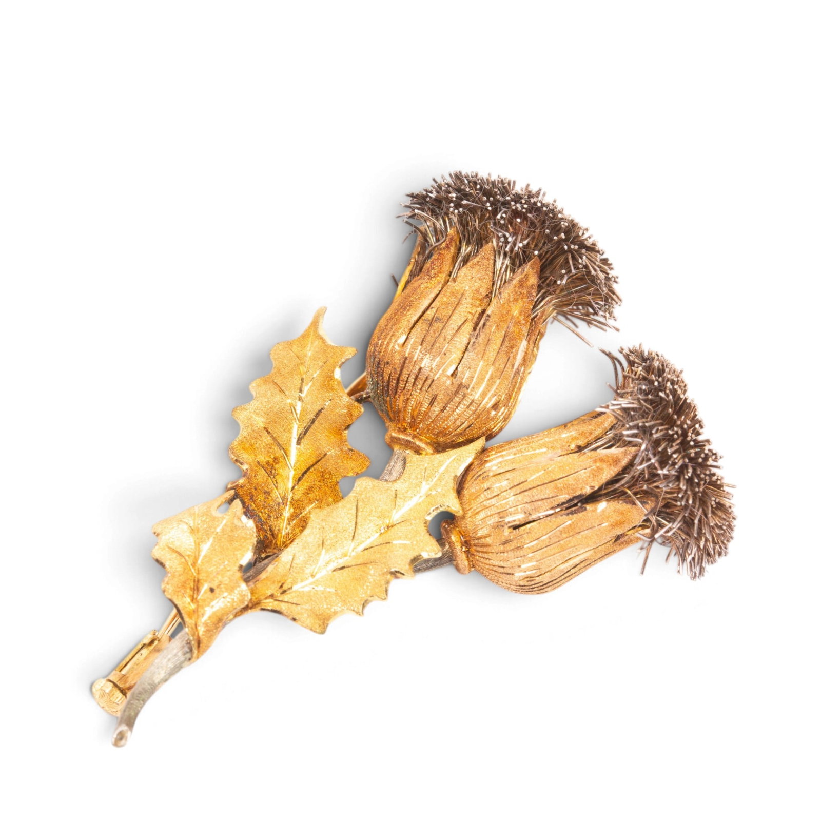 Buccellati Tricolored Gold Thistle Brooch: Buccellati 18K tricolored gold brooch realistically modeled, engraved on the reverse Ginamaria Buccellati 18K. [14.45 dwt.; 2? H x 1.5?W]. Overall condition is good to fair; some thistle top bent. Pro