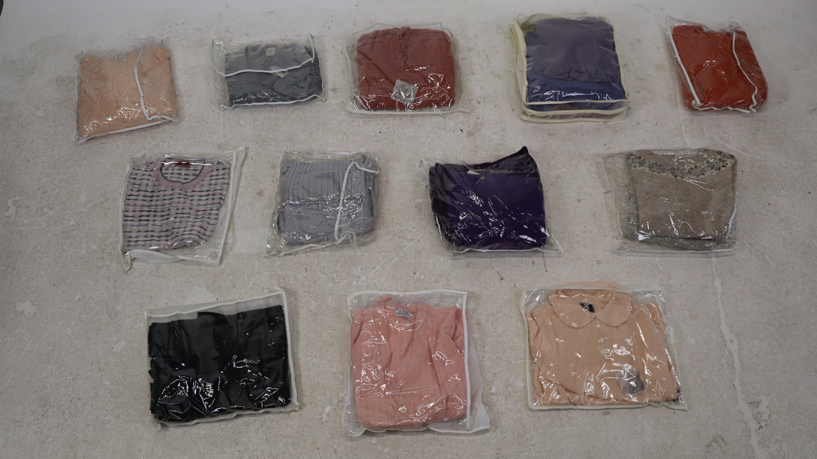 Group of Vintage Designer Wool & Cashmere Sweaters: Collection of sweaters, 20th-21st century, in various styles and colors, mostly cashmere and wool, etc. Some brands include Missoni, Armani, DKNY, Gap, Ralph Lauren, etc. Approximately 20 pieces. Size