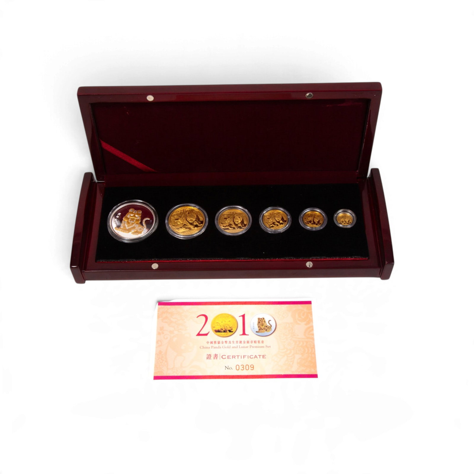 2010 China Gold & Lunar Premium Set: 2010 China Gold & Lunar Premium Set Limited mintage set of 500 issued by the People's Bank of China, containing five gold coins and one 1 oz silver Year of the Tiger medal. Total gold weight 1.9 oz of