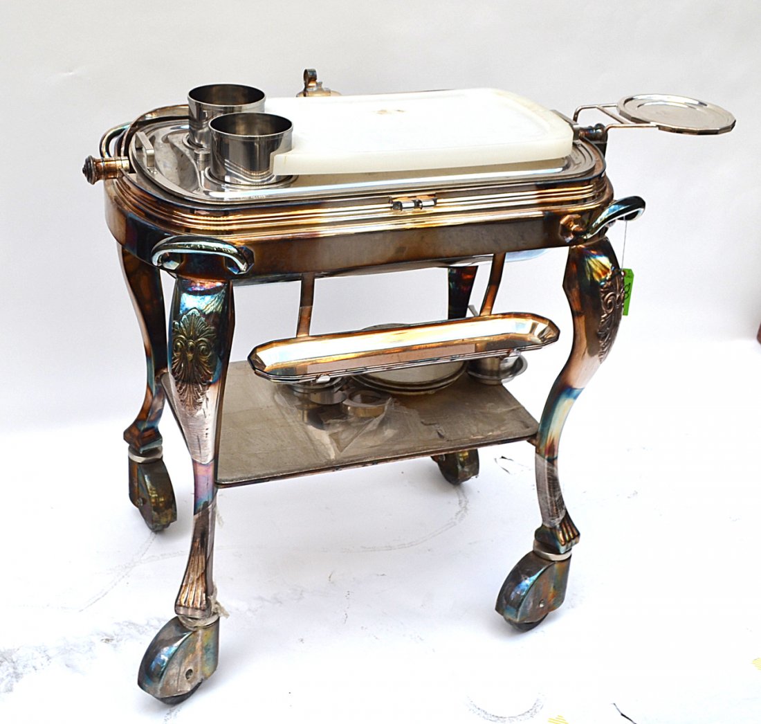 Modern Chrome Serving Cart: Ornate legs, popover top. Worn.