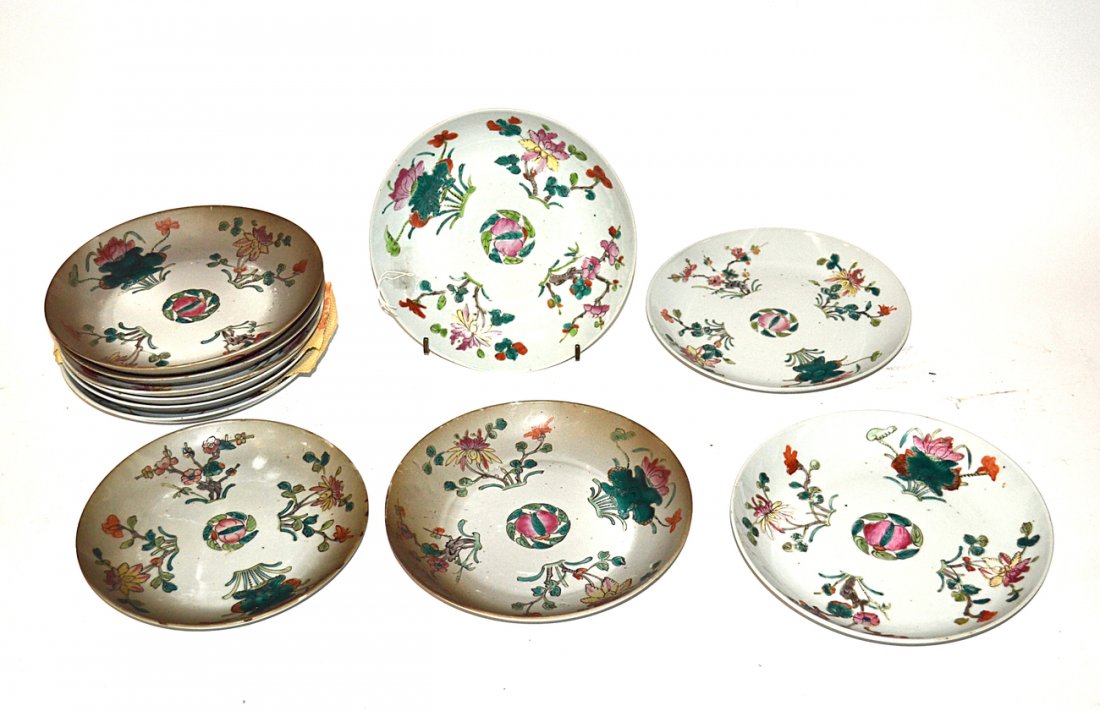 Set of 11 Chinese Glazed Earthenware Dishes: All hand spun ceramic dishes with high rims and hand painted leafy floral decor. Light wear with small chips and soiling. [Sizes vary from 8 1/2" Dia to 8 3/4" Dia]