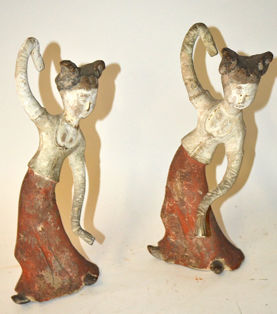 Pair of Chinese Polychromed Earthenware Dancers: Two female performers in traditional dance positions. [4 3/4" x 4 1/4" x 11" H]. Wear with loss to surface finish, soiling and repairs.