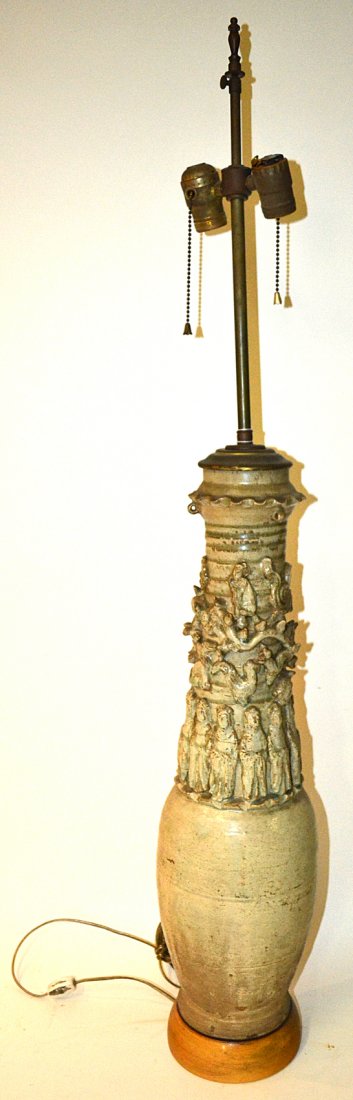 Antique Tall Asian Vase Mounted as a Lamp: Glazed earthenware lamp with a band of standing figures below a band of mythological creatures and dieties. [Vase only 6 1/2" x 23 3/4" H. Overall 42" H to finial]. Bears a crackle glaze wear and chip