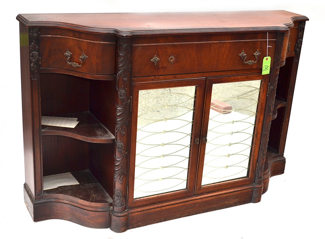Mahogany Credenza: Mahogany credenza with open sides and two mirrored doors. [57" x 16 1/2" x 36" H]. Scratches, worn.
