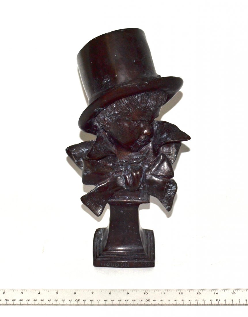 After Jean Antoine Houdon, Bronze - Bust of a Boy: Whimsical bust of a young boy in gentleman's dress with top hat. Signed on base "Houson F: 1823". [7" W x 6 1/2" D x 13 3/4" H].