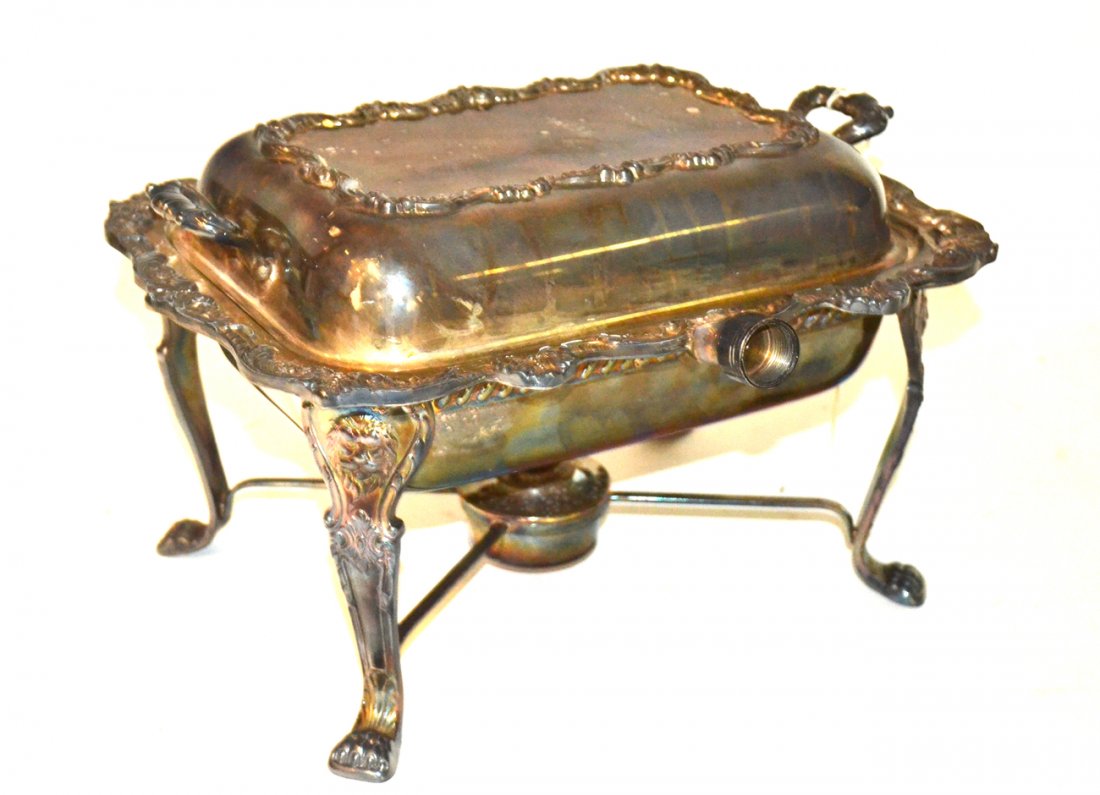 Silver Plate Georgian Style Casserole on Stand: Casserole complete with under liner, removable turned wood handle and a cover on a X-form brass stretcher. Bears original burner. [3 1/2" x 11 5/8" x 8 1/4" H].