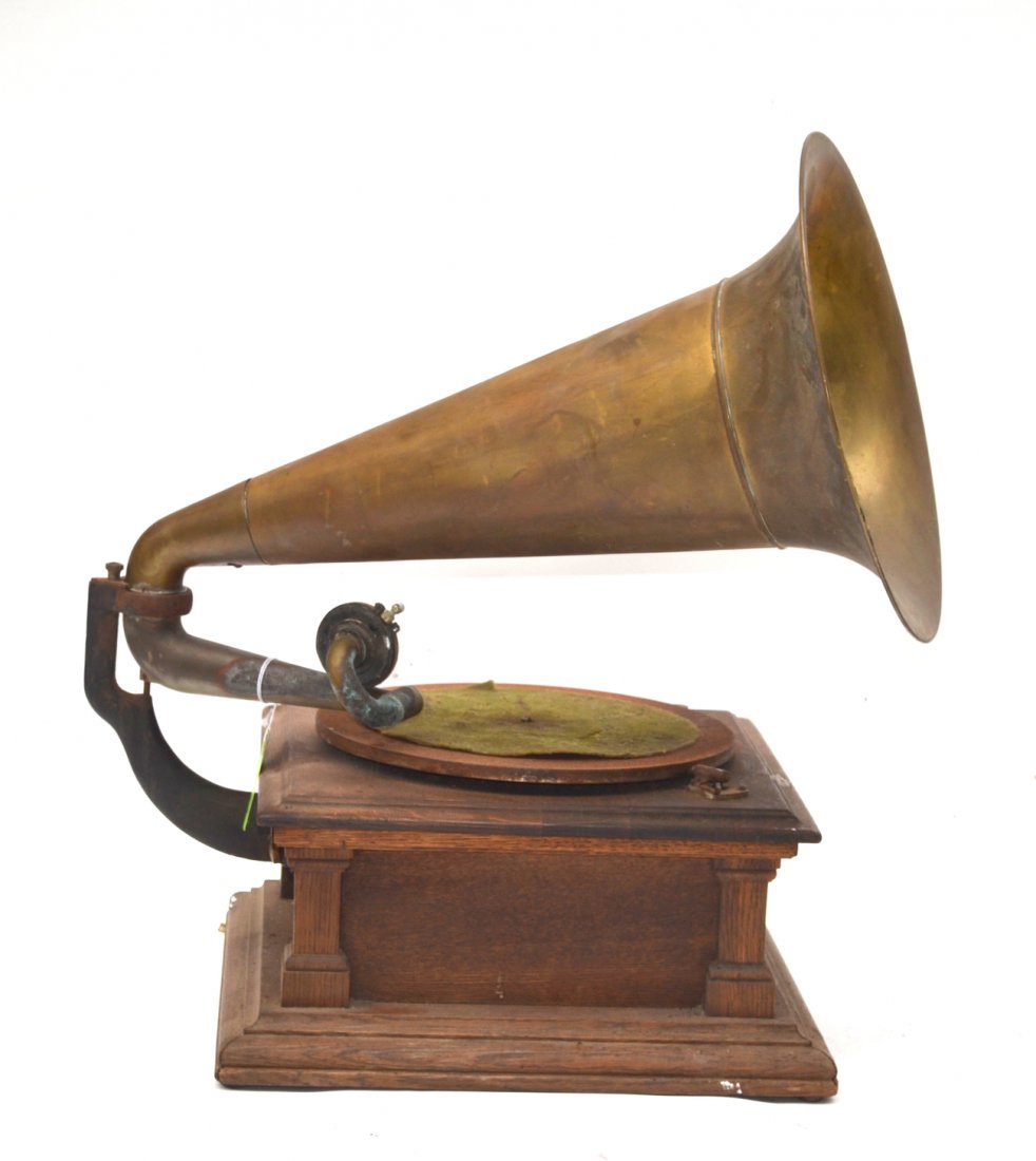 Victrola: Made by Talking Victrola MCH. Co. Worn oak case.
