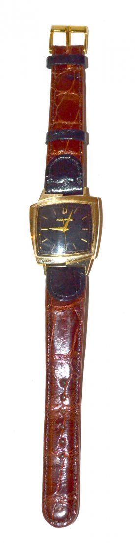 14K Bulova Accutron Watch: 14K Bulova watch engraved "BW Miller 2-25-65" with a vintage crocodile wristband. Patent #136085.