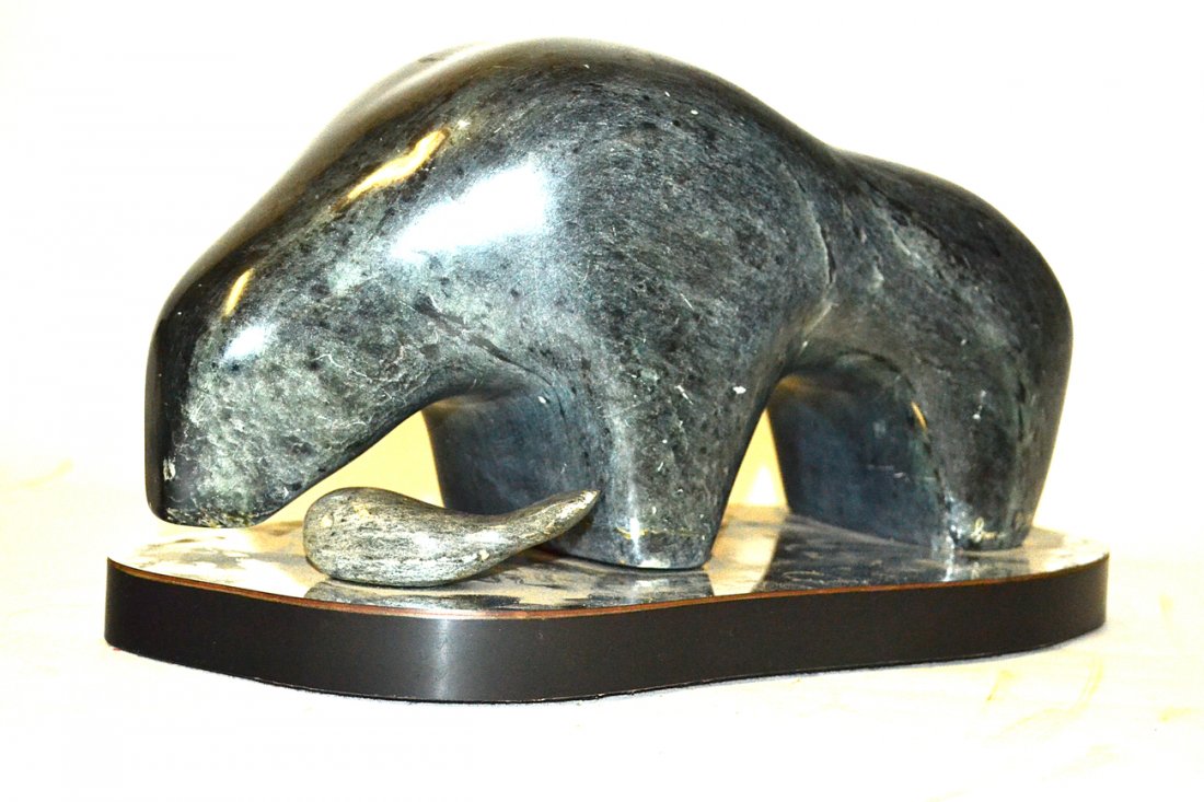 Irma Mitchell Sculpture, Polar Bear & Fish: Soapstone Eskimo Inuit type sculpture of a polar bear and a fish mounted on a biomorphic base with a reflective top. Signed on rear leg "Irma Mitchell '84". [Overall 15 1/2" x 8" x 8 1/4" H]. Scruffs 
