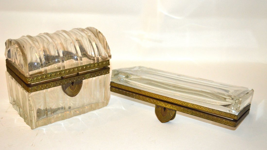 Vintage Cut-Crystal & Bronze Box: Dome-top box with bronze mounts. Features deep fluted surface. Bears chips at front corners box and lid. [5 5/8" W x 5 7/8" H x 4 1/8" D]. Accompanied by a crystal lid with matching mounts, missing bo