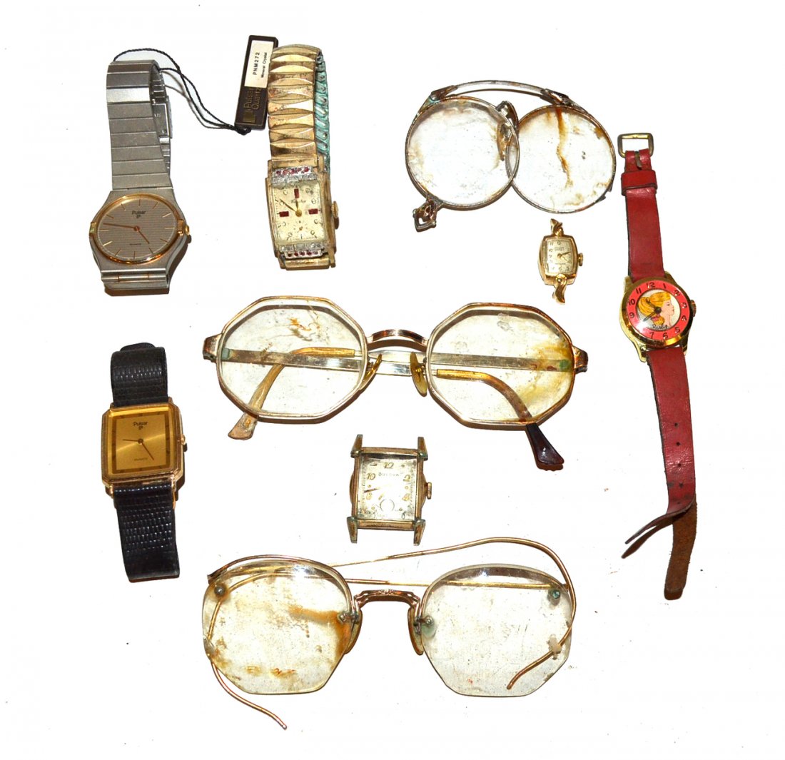 Assorted Men's and Women's Watches: Vintage and modern watches. Makers include Pulsar, Bulova, Kingston and Gruen. Accompanied by a vintage "Barbie" watch. All sold together as is, some water damage.