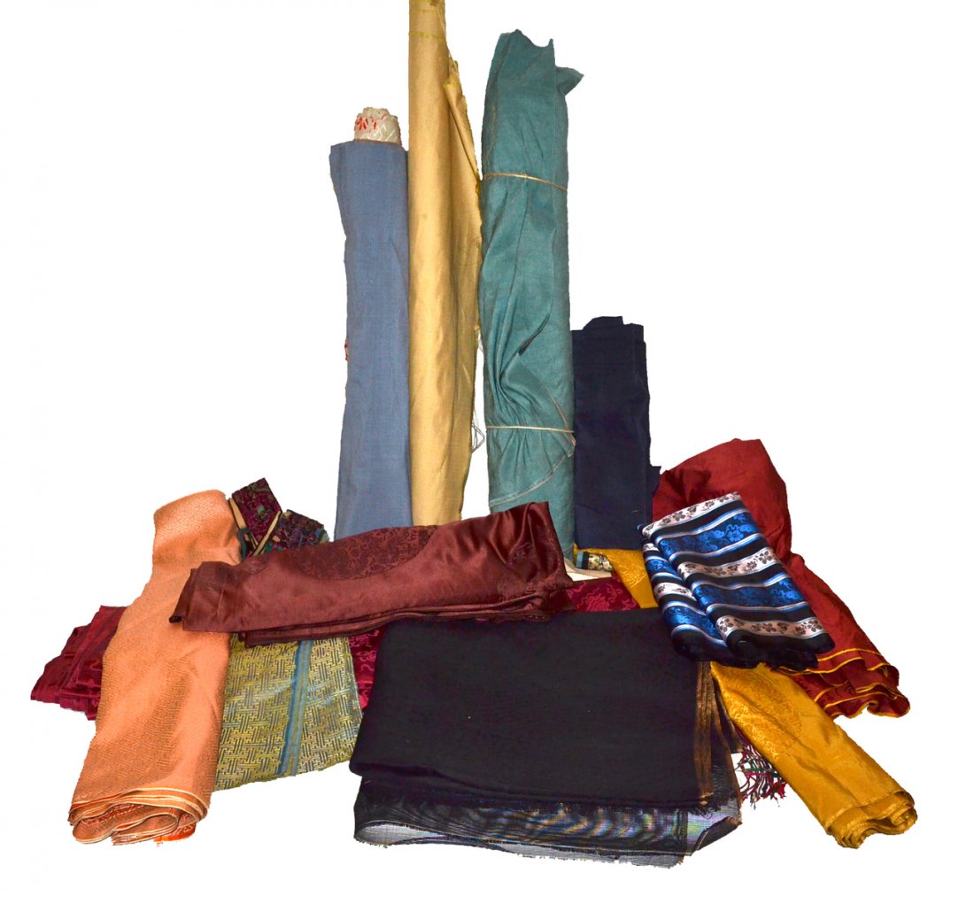 Modern Asian Textile Lot: Textiles including silk, silk brocade, embroidery, stamped velvet, and others. Includes small bolts. Designs span geometric to calligraphic. 15 items total.