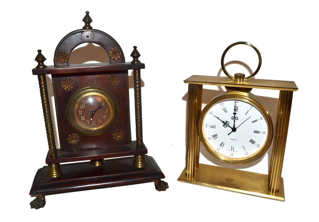 Two Clocks: A brass clock by Relide, and an eight day clock.