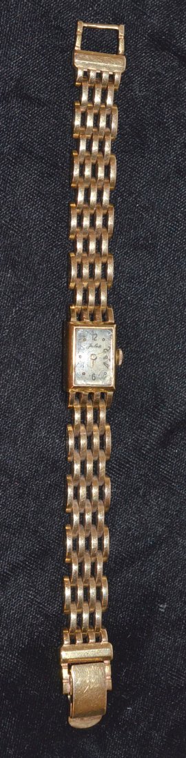Vintage 14k Gold Ladies Watch: Jules wrist watch with 14k gold link band and case. Crystal is chipped. Not tested, sold "as is". 26.7 dwt (without movement and crystal).