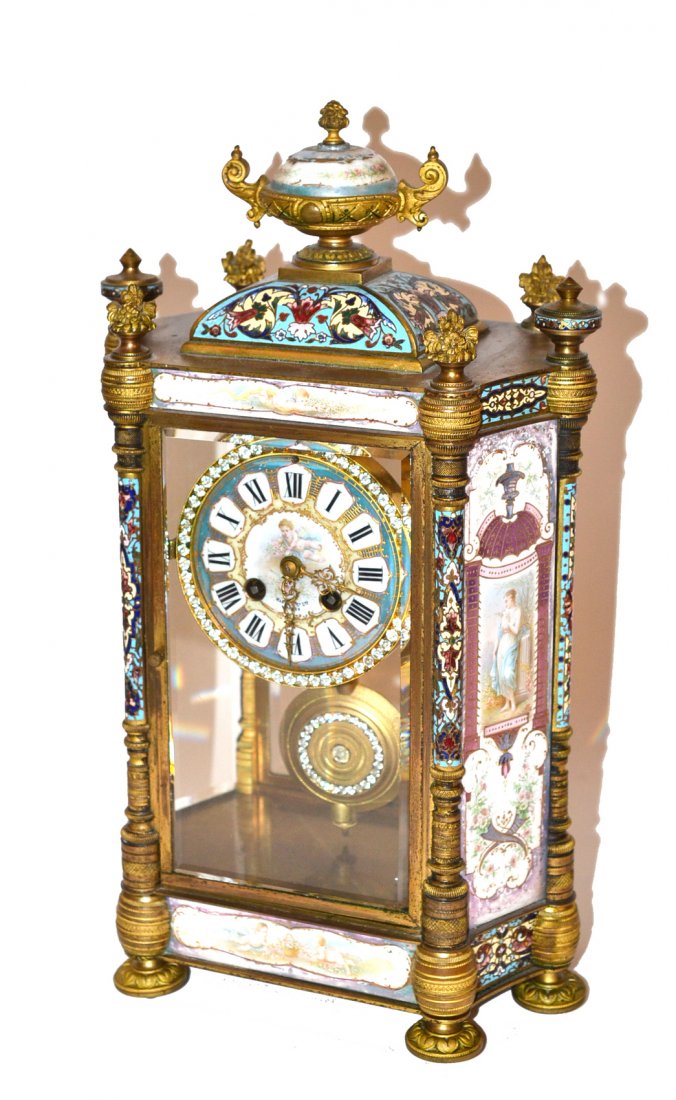 Antique French Cloisonné and Doré Bronze Clock: Ornate clock by Maple & Co. LTD. of Paris. Features bronze doré frame with cloisonné accents throughout and enameled glass panes depicting neoclassical figures. Bears a pictorial porcelain faceplate