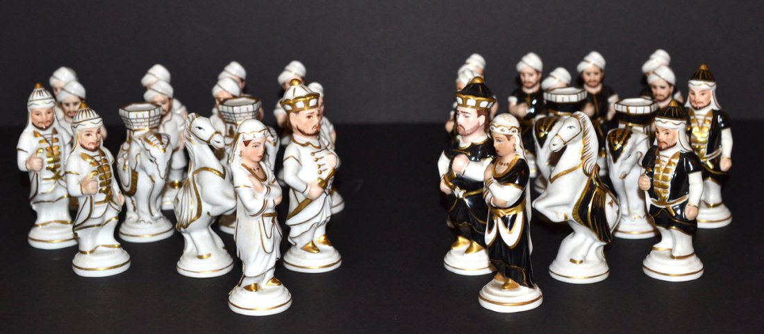 30-Piece Royal Dux Porcelain Chess Set: Orientalist themed set. Each side lacking one piece. [Height of tallest 4 1/4"]. Otherwise in good condition.
