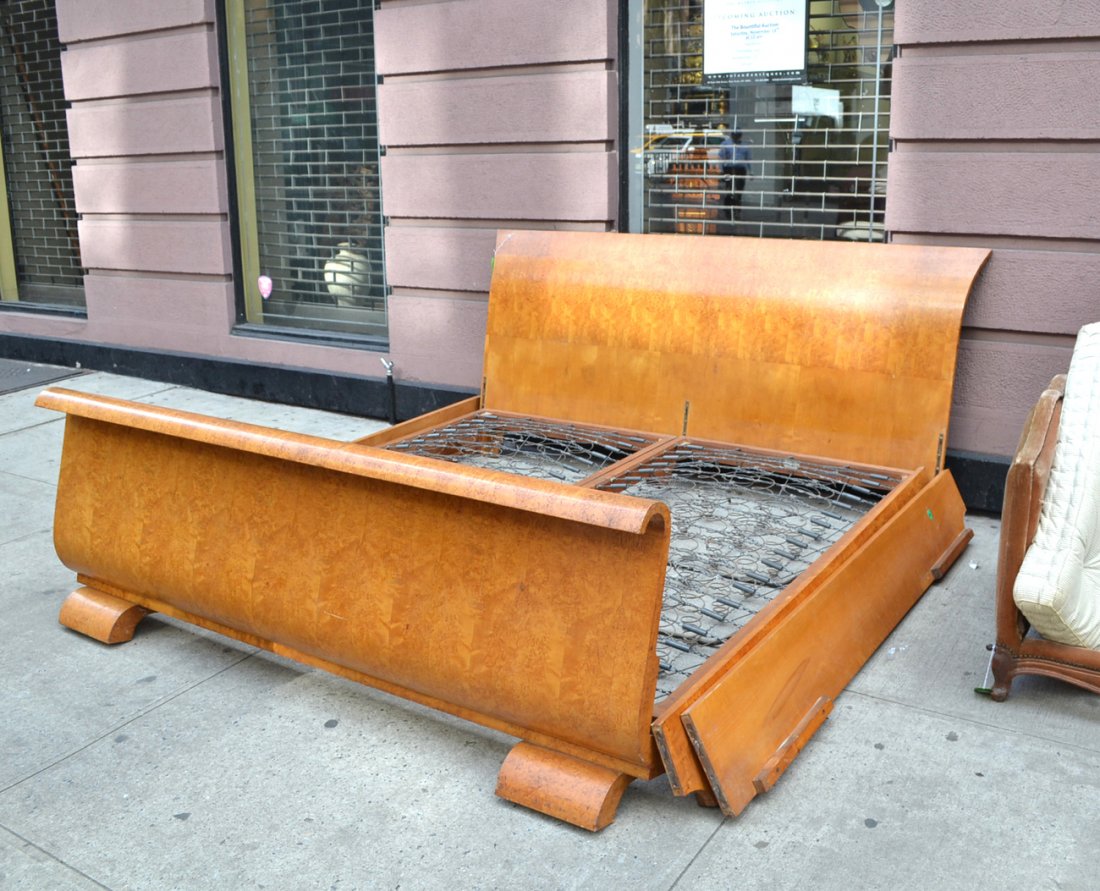 Art Deco Burl Wood Bed: En suite with previous lots 329, 328, 327. Having flared and rolled head and footboards. Complete with rails and custom box spring. Some scratches and losses to veneer along edges. [82 1/4" wide].