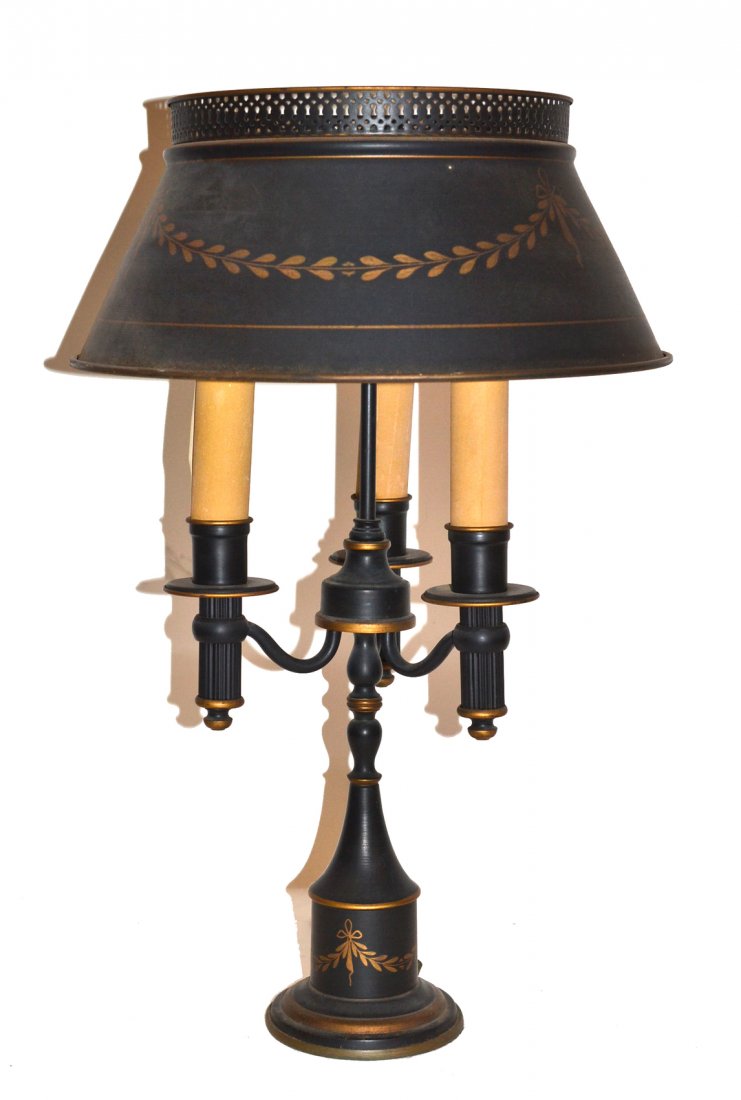 Tole Painted and Gilt Lamp: Black with gilt decoration. Having matching shade. Overall good condition. [25" h].