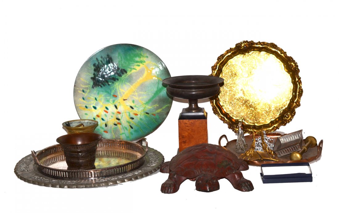International Mixed Metal Lot: Includes: Bronze, brass, silver plate, steel, copper, and tin. Comprises: turtle-form spittoon, trays, mortar and pestle, chargers, and urn-form bowl on marble base and others. Conditions vary, all so