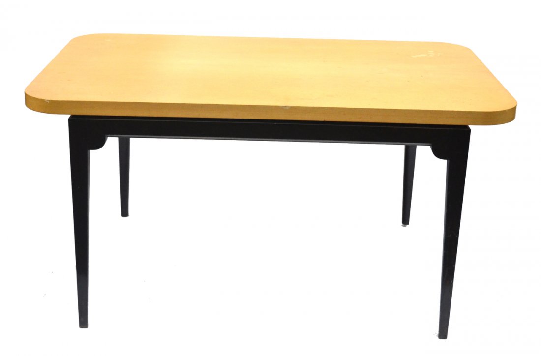 Tommi Parzinger Originals Table: 20th Century modern dining table, bird's eye maple top and black lacquered base. [58" x 36" x 29 3/4" h].