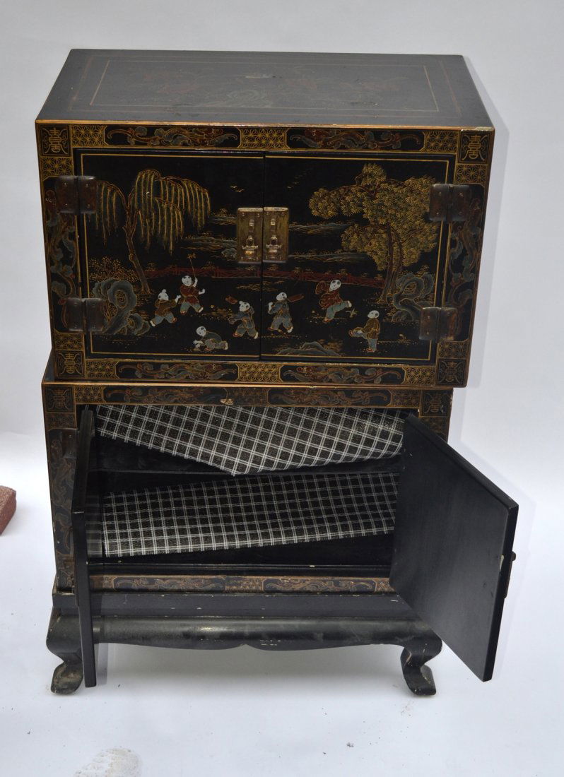 Chinoiserie Ebony Cabinet: Chinese four door cabinet. [23" x 13" x 28" h].