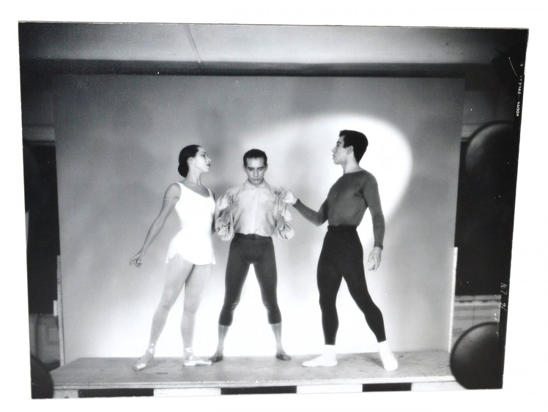 Ballet Memorabilia - Photograph: Photograph mounted on board and unframed. "The Guests" 1949, by George Platt Lynes and featuring Maria Tallchief, Jerome Robbins and Nicholas Magallanes. Surface scratches. [Image: 14" x 18 7/8"]. Fro