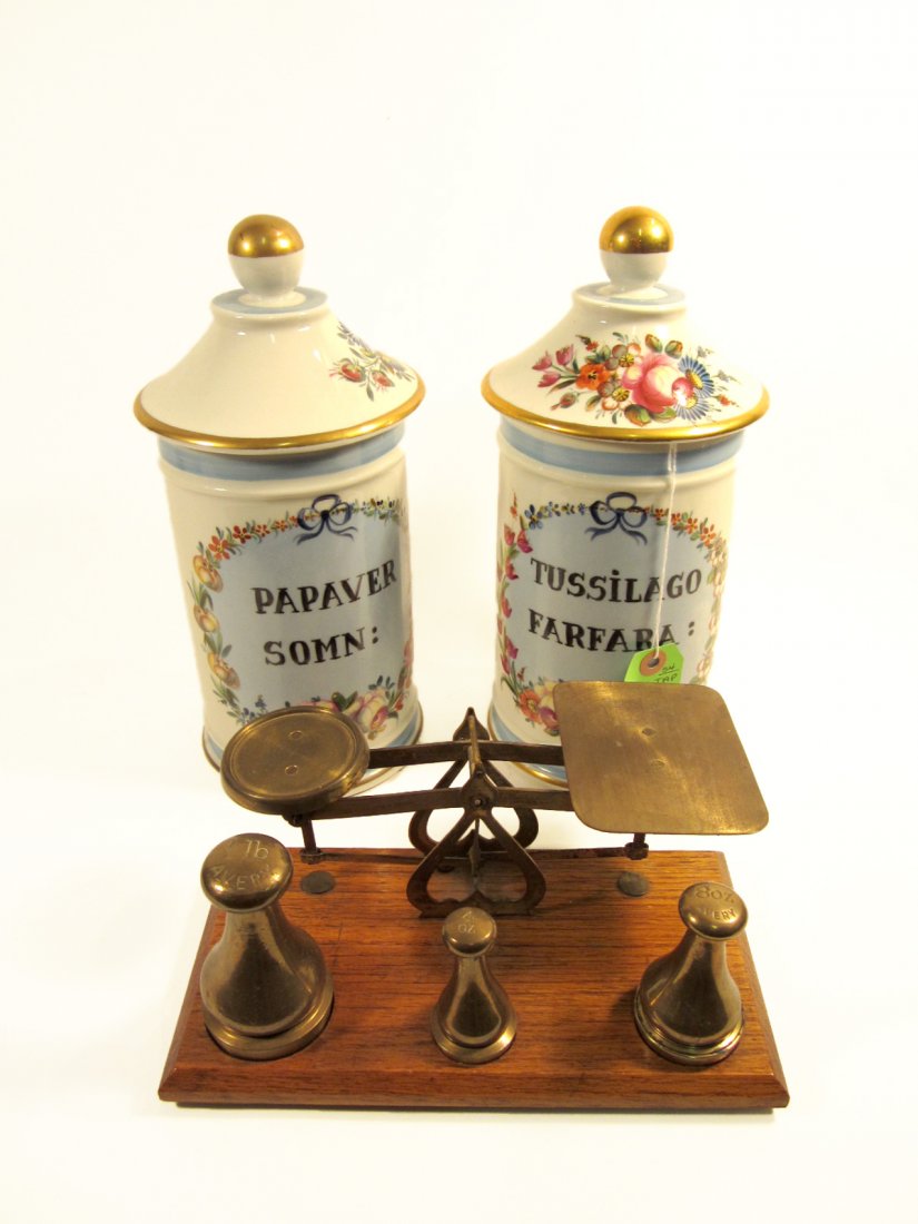 Brass Scale & Pair of Apothecary Jars: The scale has three brass weights. One apothecary jar chipped. [11" H of taller].
