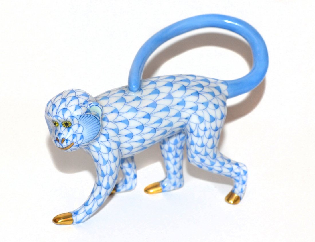 Herend Porcelain Blue Walking Monkey: Depicts monkey with all-over scale pattern and gilt accents [5" w x 2 1/4" d x 3 1/2" h]. Numbered on bottom proper left hand "L5391/VHB K94". Excellent condition.
