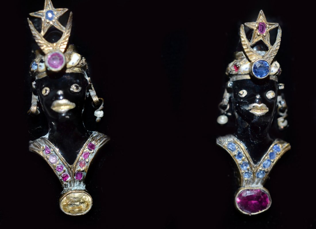 Pair of Blackamoor Earrings: Enameled metal, mounted with paste. Circa 1930. In good condition. [1 1/4" h]