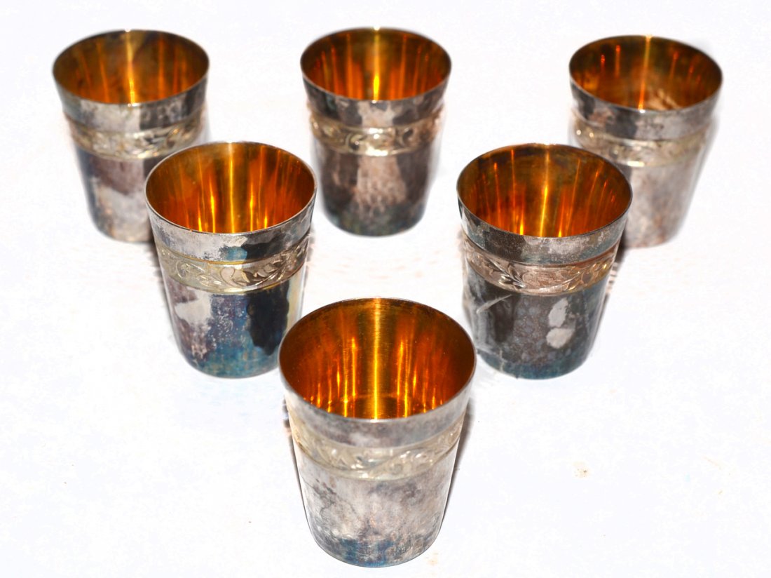 Set of Six Sterling Shot Glasses: Martele finish and engraved foliate band. Good condition. [4.1 ozt]