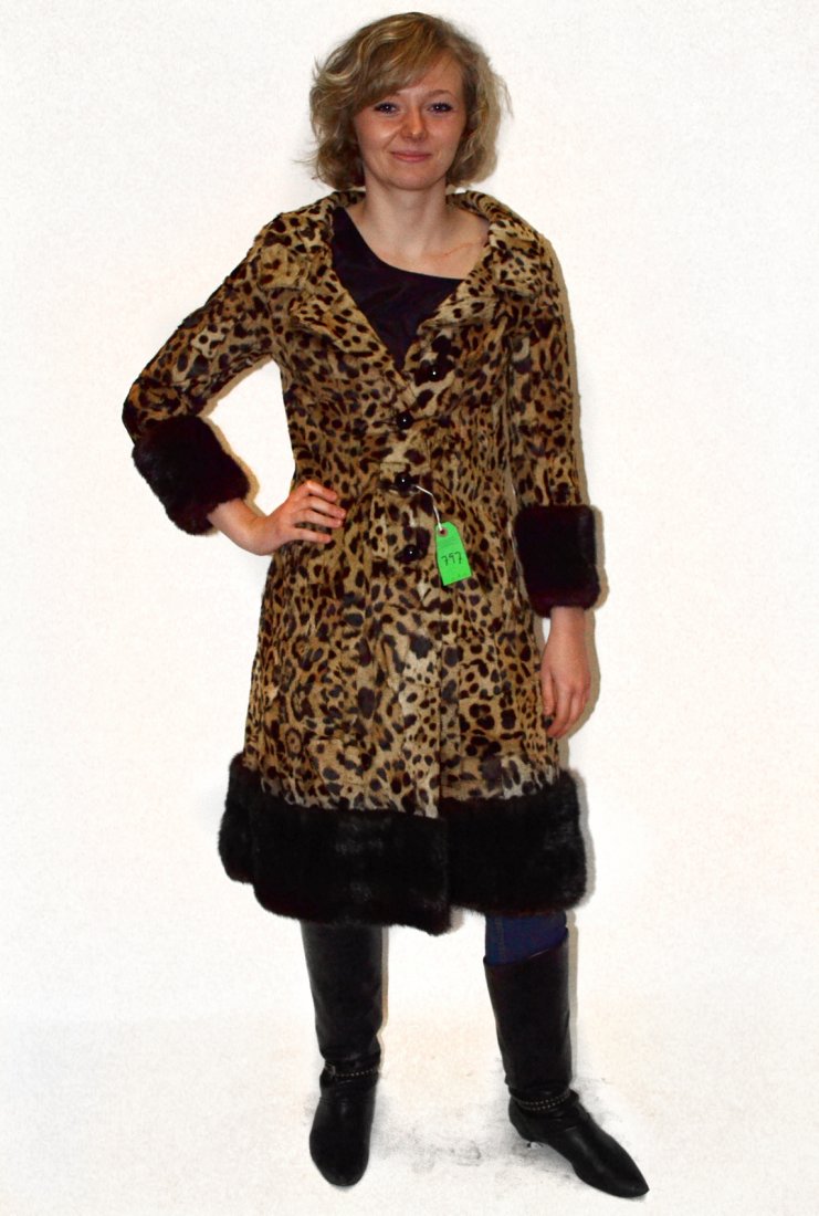 Vintage Leopard Fur Coat: B. Altman retail label. Good condition with mink ciffs and hem. [41" long]. This coat is extremely small, most likely a size 0-2.