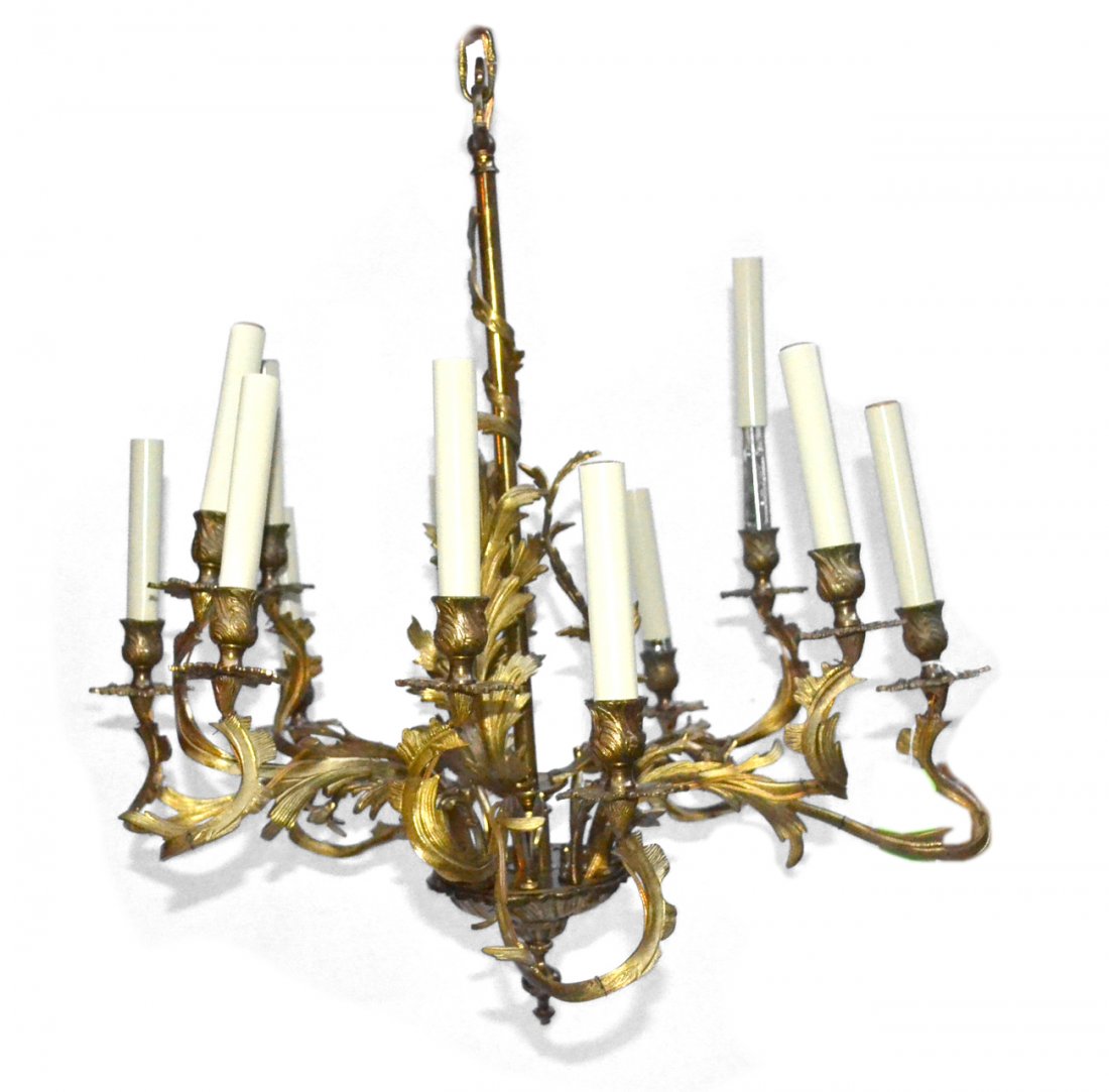 Twelve-Light Chandelier: Bronze dore twelve light fixture. [23" dia x 24" h].