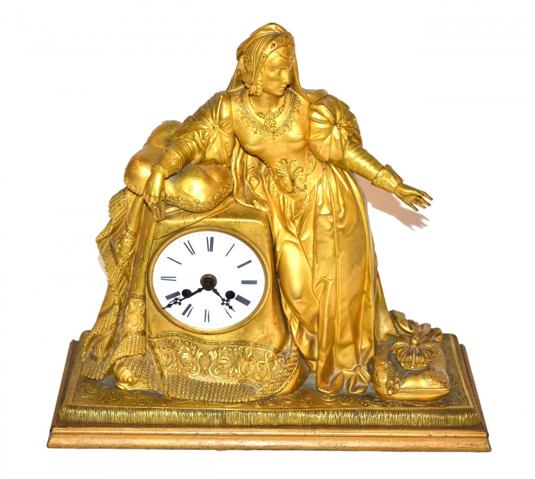 Antique Bronze Dore Mantle Clock: Cast and chased naturalistic depiction of a woman in Elizabethan costume with a scepter and crown at her feet. Unsigned. Movement replaced with quartz mechanism. [15 1/4" w x 5 1/2" d x 14 1/2" h].