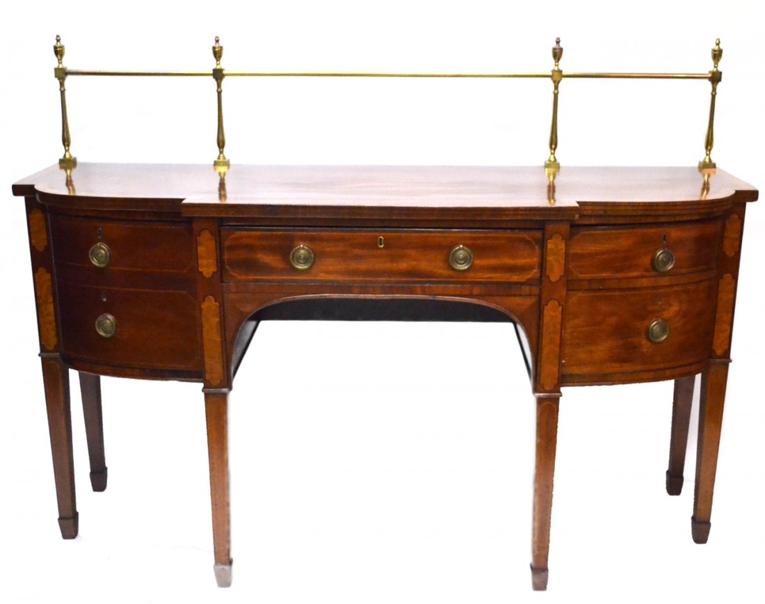 Sheraton Style Sideboard: 19th century English mahogany banded sideboard, with brass gallery, two faux drawer doors, one having a fitted drawer. [69 1/4" L x 22 1/2" D x 51" H; 37" surface height].