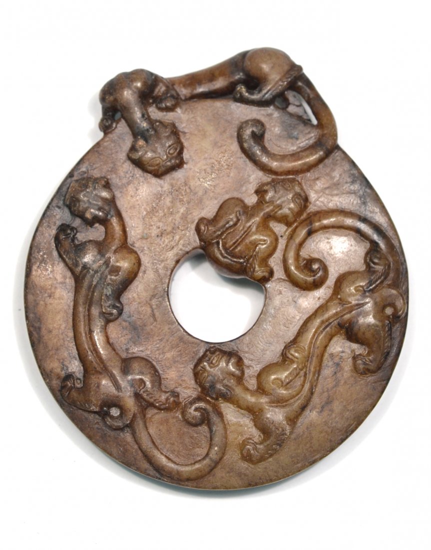 Asian Jade Bi with Dragon Decor: Dark green/brown jade bi disc featuring three carved dragons on either side with one on top. [3 1/2" W x 1/2" D x 4 1/8" H].