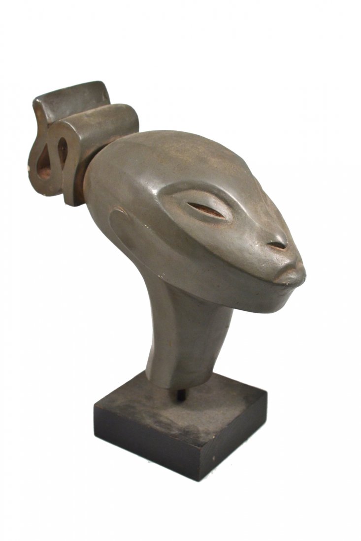 Vintage Fred Press African Female Bust: Stylized Mid-Century Modern African woman with sculptural headdress. Bust only: 4 1/4"W x 9 5/8"D x 8 3/4"H. On wood base: 10 5/8"H. Chips at edges.