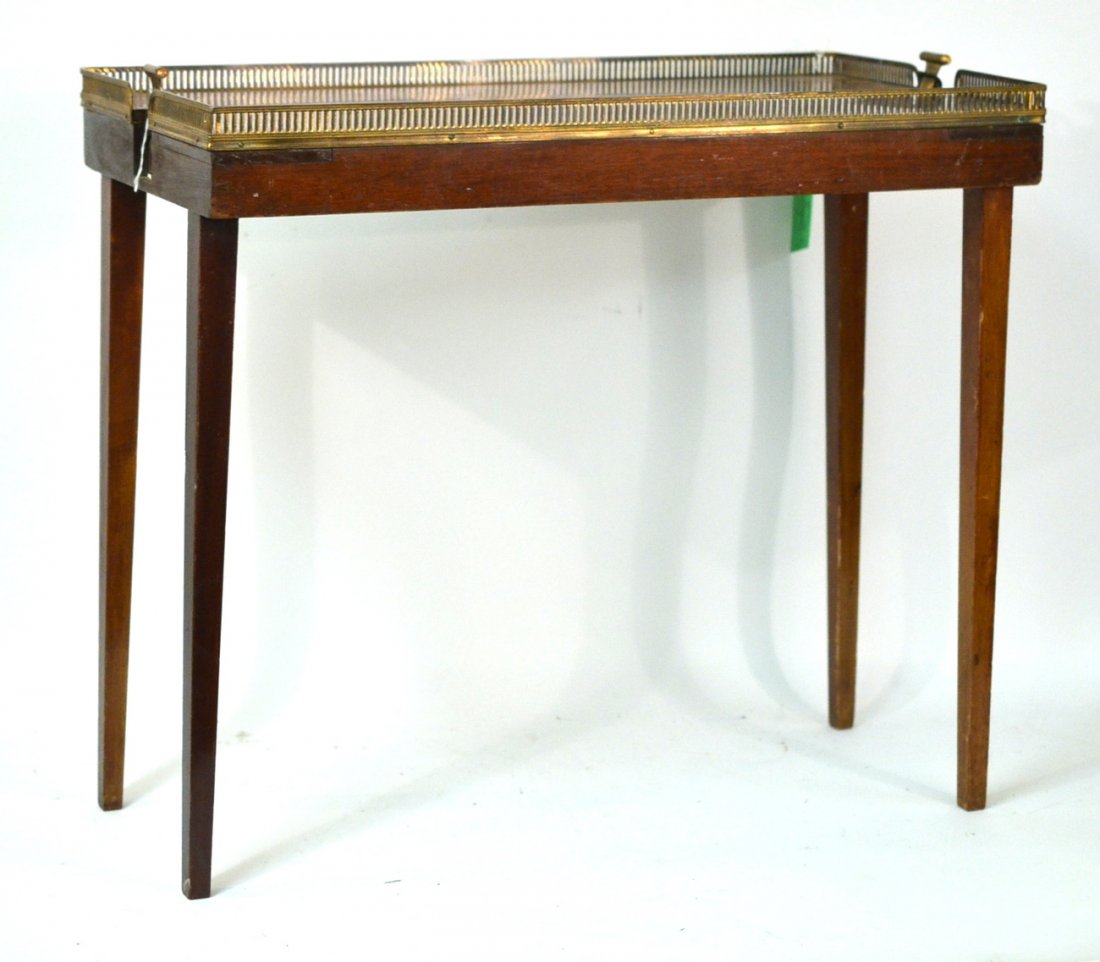 Inlaid Tray Table: 19th century mahogany urn inlaid table, brass handles. The legs fold underneath by means of a release mechanism at either handle. [27" x 14" x 24 1/2" H]. Some wear.