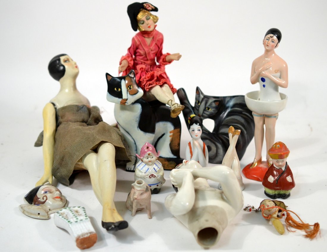 Vintage Porcelain Doll Parts and Others: Comprises: two half doll torsos, puff base, legs, face plaque, ceramic doll in reclining pose and others. Condition varies, all sold together as is. 10+ items.