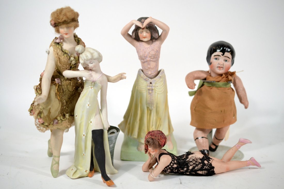 Vintage Bisque Porcelain Dolls and Figures: Comprises: 1.) Baby doll marked "Nippon" ca 1930 [3" W x 1 3/4" D x 6" H]; 2.) Noder figure depicting a dancing woman in Egyptian costume [3" W x 2 1/4" D x 7 1/2" H]; 3.) Bisque woman with basket-for