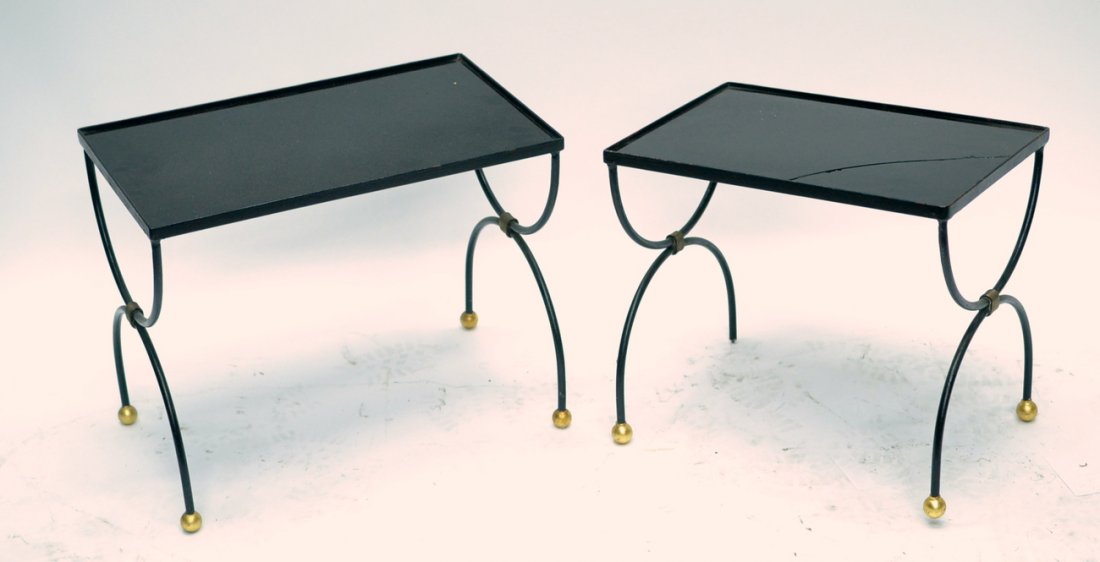 Two Modern Nesting Tables: Steel X-form tables with gilt ball feet. 19 1/4"W x 11 3/4"D x 15 1/4"H. Smaller table missing two feet and cracked glass top.