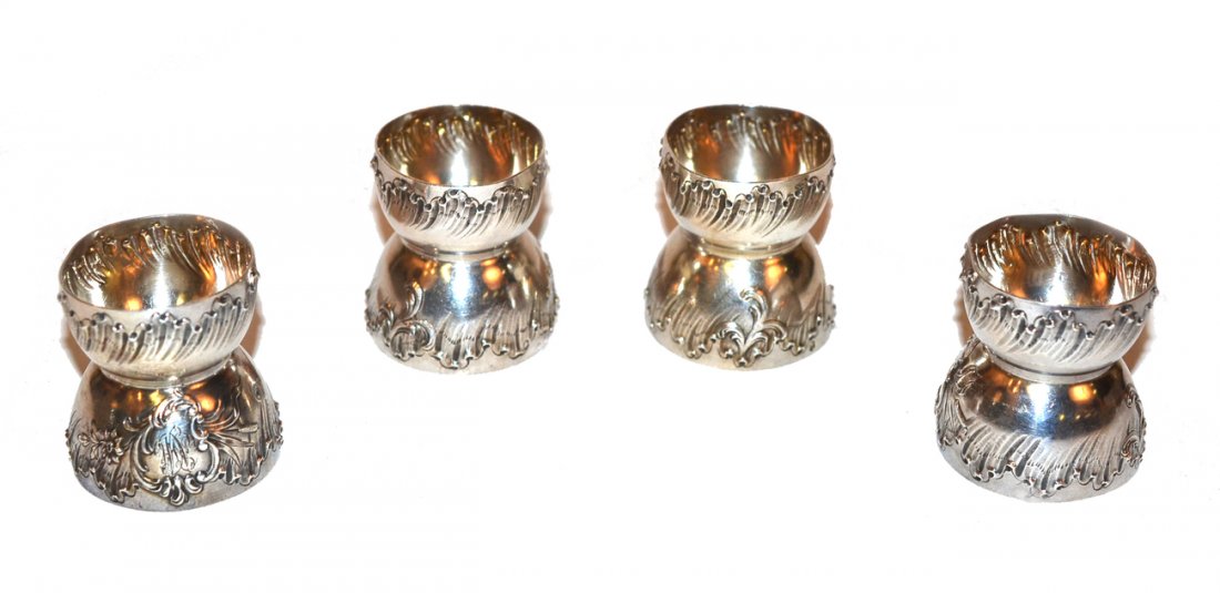 Set of 4 Continental Silver Egg Holders: In the Rococo taste. Some light dents, otherwise in good condition. [1 7/8" h]. 3.635 ozt.