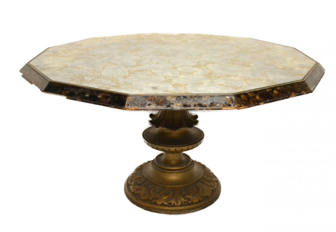 Dodecagon Mirrored Low Table: Smoke glass decorated twelve sided low mirrored table on a gilt carved base. [35 1/2" dia x 18" H]. Missing one side panel.