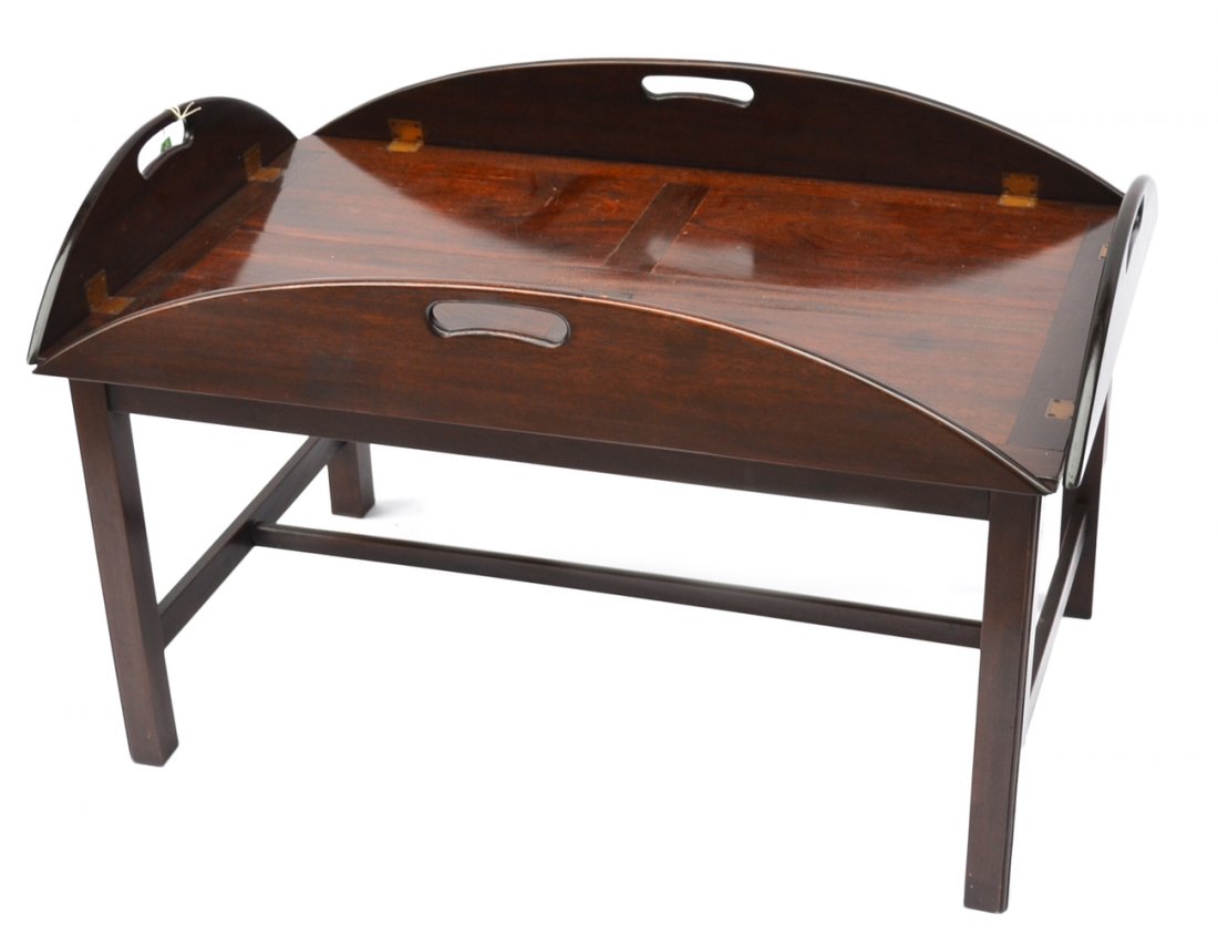 Oversize Butler's Table: Mahogany butler's table with four-panel top, brass finish hardware, and straight legs. [Closed: 38" W x 25" D x 23" H]. Scratches and scuffs.